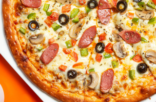 Pizza with toppings and sauce